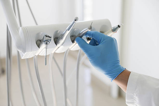 Professional Tooth Extraction technician working in Kalkaska, MI